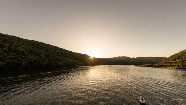 Sol baixo na represa